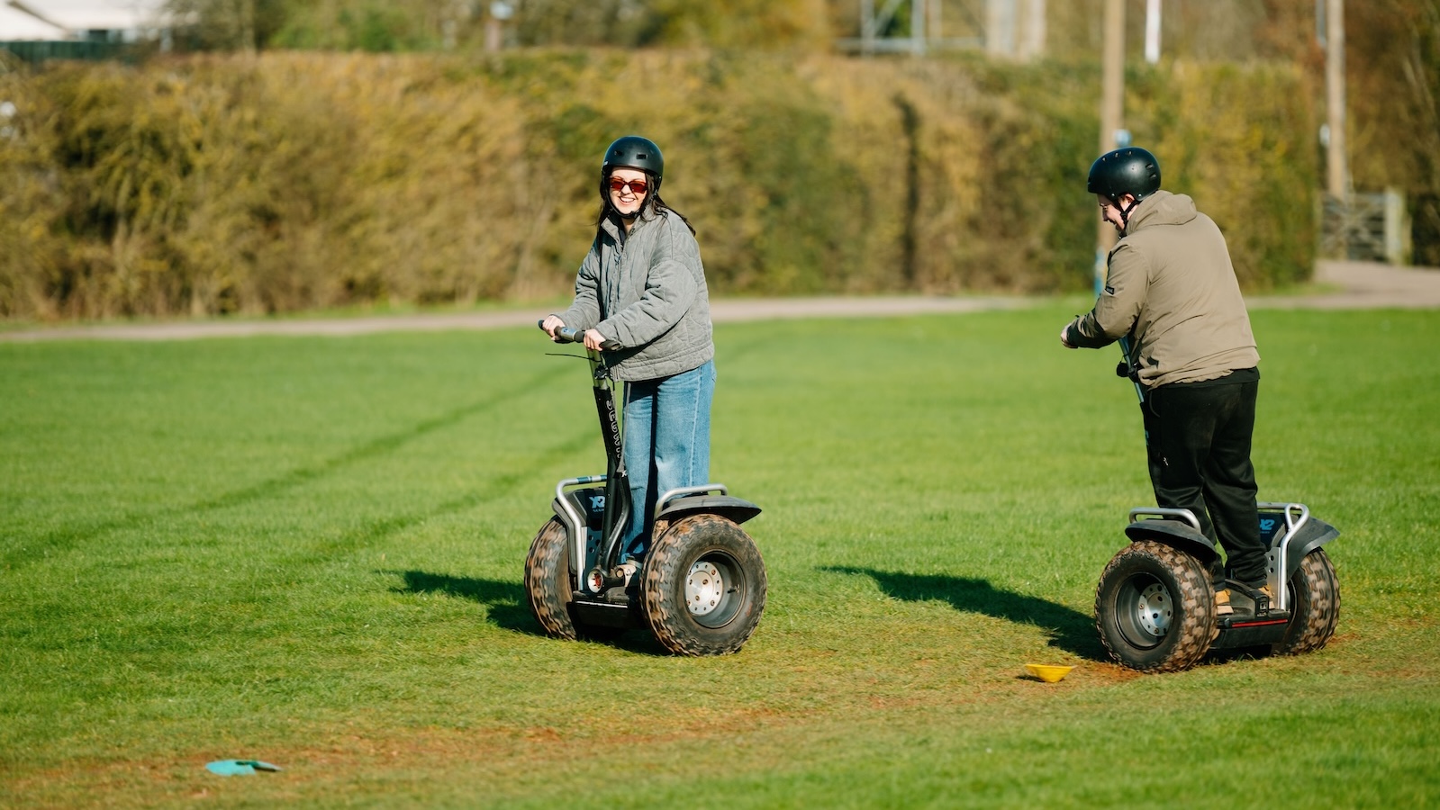 2 people on scooters