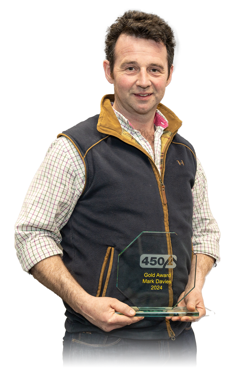 Man holding Club Award winner trophy